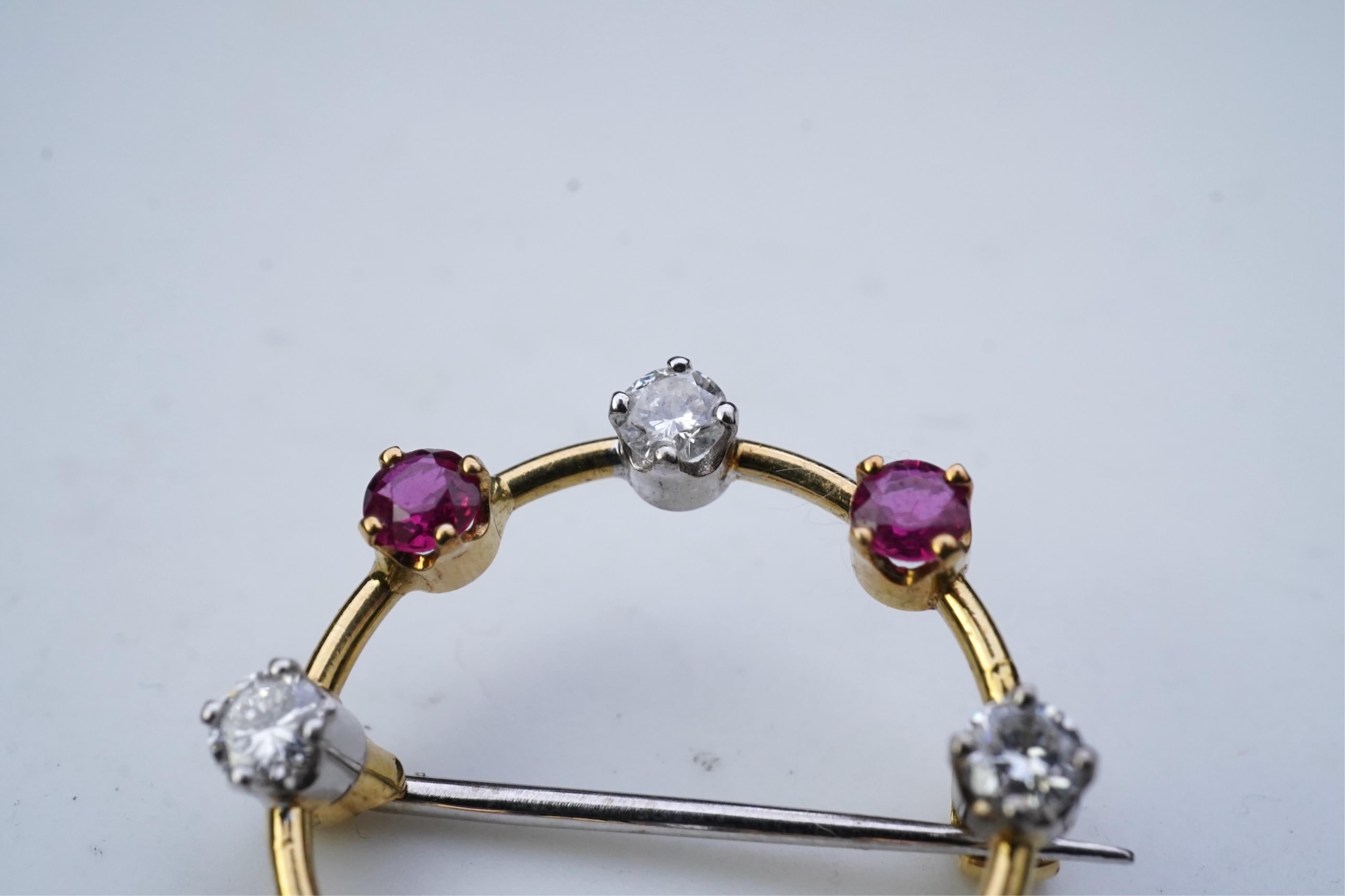 A ruby and diamond brooch